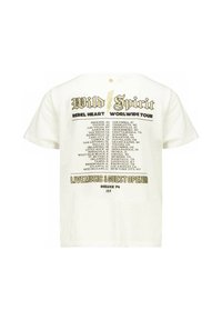 Witte katoenen t-shirt met vet zwart en gouden tekst. De achterkant toont "Rebel Heart Worldwide Tour" met stadnamen en evenementdetails.