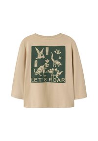 Beige Baumwoll-Hemd mit langen Ärmeln, das ein grünes Dinosaurier-Motiv mit dem Text "LASST UNS BRÜLLEN" zeigt. Lockere Passform, Rundhalsausschnitt, weicher Stoff.