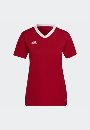 Rood voetbaltshirt met korte mouwen en een witte V-halskraag, met drie witte strepen op de bovenste linkerkant. Gemaakt van lichte stof.