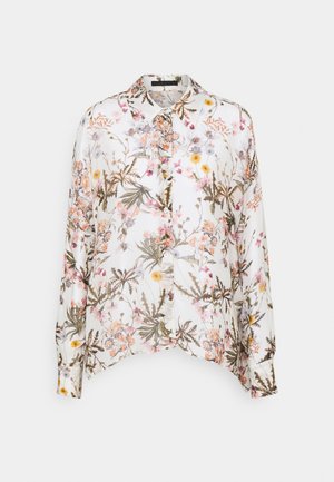 Hvid langærmet knappet bluse med krave med et flerfarvet blomster- og bladermønster i pink, gule og grønne toner.