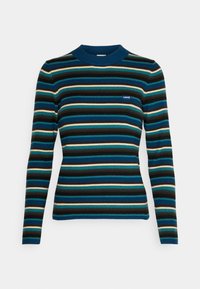 Top a maniche lunghe a righe in tessuto a coste con strisce orizzontali blu, verdi, marroni e gialle. Scollo rotondo e design aderente.