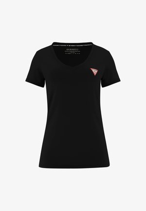 Melnas v-veida t-kreklas, kas izgatavots no gludas auduma, ar mazu sarkanu un baltu logo uzlīmi kreisajā krūtīs. Īsas piedurknes un pieguļošs dizains.