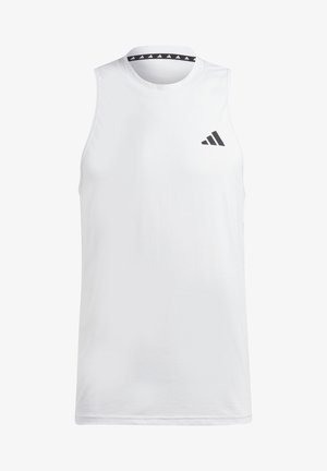 Valge ilma varrukateta sporditopp, mis on valmistatud siledast kangast. Omab musta logo vasakul rinnal ja mustrilist musta kaelust.