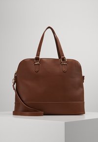 Brown leather handbag with dual top handles, detachable shoulder strap, and smooth textured body. Features gold-tone hardware and a structured shape.