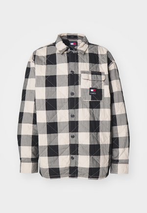 Sort, hvid og grå ternet quiltet langærmet skjorte med frontknapper og en brystlomme med et logo-patch.