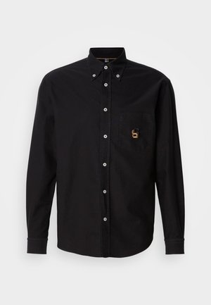 Black long-sleeve button-up shirt with button-down collar and a chest pocket featuring a small embroidered gold and black logo.