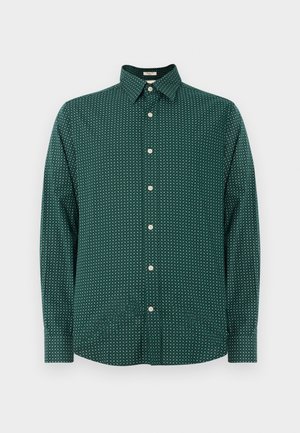 Dunkelgrünes Langarmhemd mit kleinem weißen Blumenmuster, Knopfleiste und spitzem Kragen auf weißem Hintergrund.