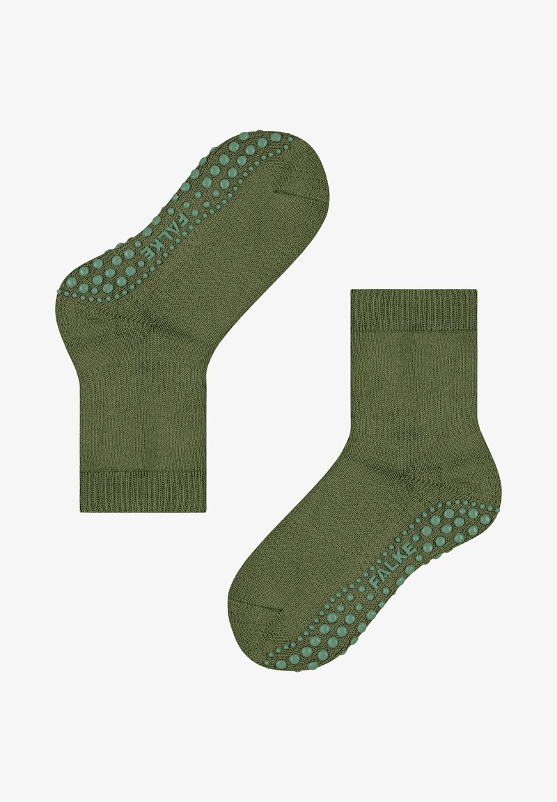 Skarpetki w oliwkowym kolorze z teksturowanej tkaniny, z prążkowanym ściągaczem i silikonowymi punktami antypoślizgowymi na spodzie dla lepszej przyczepności. Przeznaczone do użytku wewnętrznego.