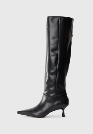 Black leather knee-high boot with a pointed toe and slim curved heel. Smooth texture, fitted design, and no visible hardware or patterns.