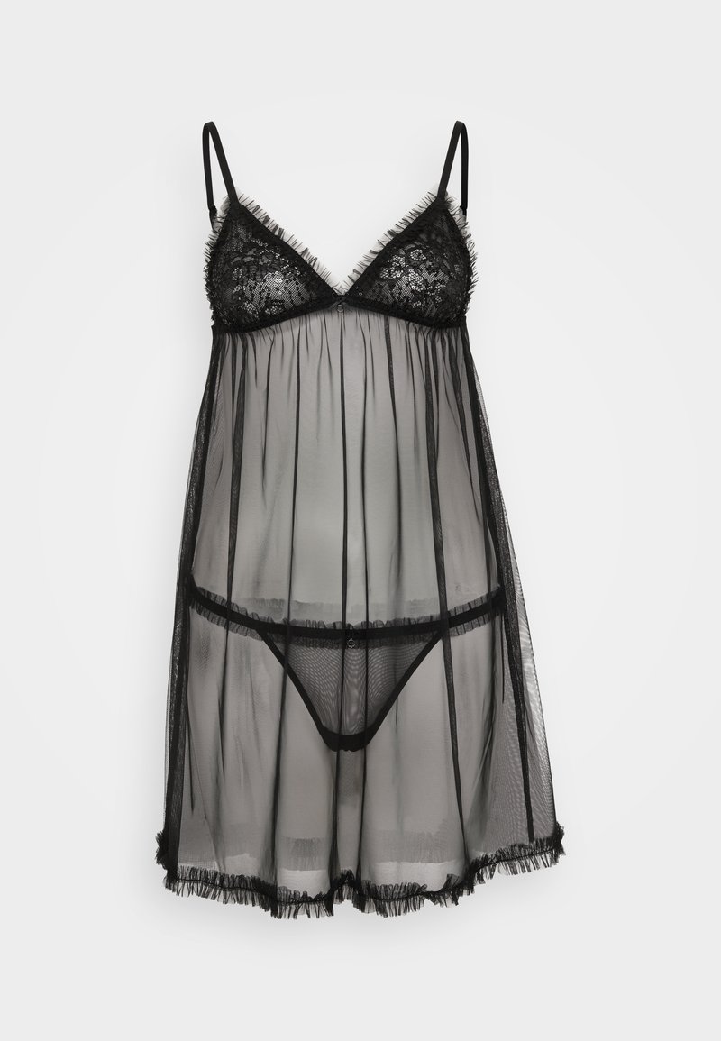 Nuisette transparente noire avec des bordures en dentelle, des bretelles ajustables, un bustier ajusté et un string assorti en dessous. Détails à l'ourlet à franges.