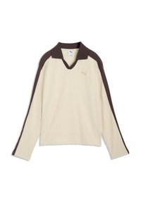 Κρεμ πουκάμισο με μακριά μανίκια, σκούρο καφέ γιακά και ρίγες στους ώμους, με ριγέ υφή και μικρό χρυσό λογότυπο Puma στο στήθος.