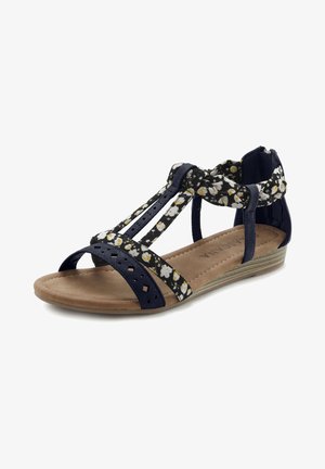 Blaue Sandale mit floral gemusterten Riemen, Ausschnittdetails und strukturiertem Fußbett. Verfügt über einen Knöchelriemen und einen niedrigen Keilabsatz.