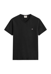Čierne tričko s krátkym rukávom a výstrihom do V s malým vyšitým logom na ľavej strane hrudníka a štítkom značky vo vnútri goliera.