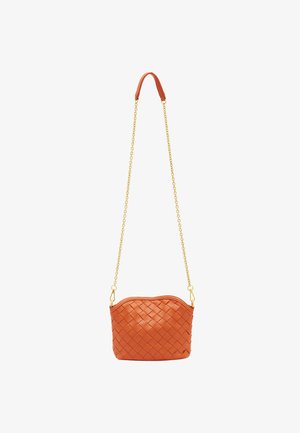 Woven orange leather bag with a curved top, gold chain, and leather-accented strap. Compact, rectangular shape with textured surface.