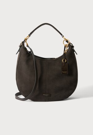 Dark brown suede shoulder bag with gold hardware, curved shape, top handle, and detachable long strap.