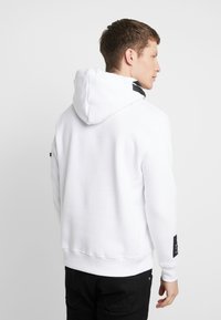 Alpha Industries ALPHA UNISEX - Hoodie - white