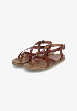 Brown leather sandals with multiple straps, a thong design, and a textured ankle strap. Flat sole with a light brown base.
