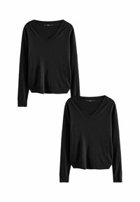 Pull en noir à manches longues avec un décolleté en V et des poignets côtelés. Fait en tissu doux, il présente une coupe décontractée et un design simple.