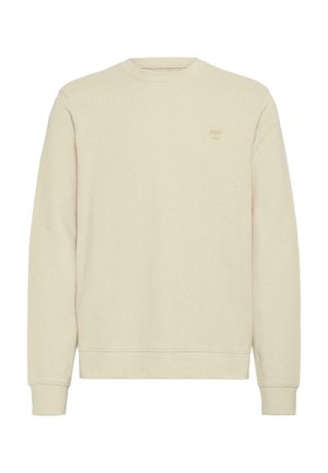 Svetre krémovej farby vyrobený z textúrovaného materiálu, s okrúhlym výstrihom, rebrovanými manžetami a malým logom vyšitým v béžovej farbe.