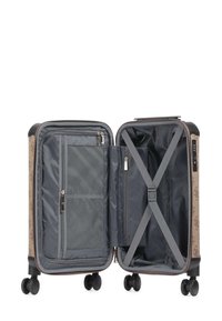 Valigia di medie dimensioni con esterno a fantasia, quattro ruote, cinghie di compressione interne, tasca in rete con zip e scomparti organizzati.