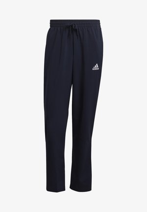 Schwarze Adidas-Trainingshose mit elastischem Bund und Kordelzug, mit dem weißen Adidas-Logo am rechten Oberschenkel.