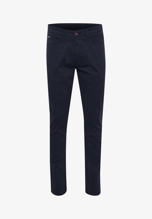 Mørkeblå bomuldsbukser med slim fit, med lynlås foran, fem lommer og en lille logoaccent foran. Glat tekstur.