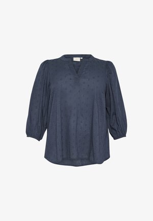 Chemise bleu marine avec un col en V, des manches ballon et un motif texturé. Fabriquée dans un tissu léger, elle offre une coupe décontractée et un ourlet arrondi.