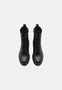 Tamaris Botines con plataforma - black