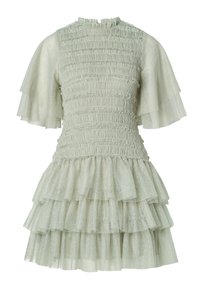 Light green dress with a smocked bodice, ruffled short sleeves, and tiered ruffle hem. Made from textured fabric with a subtle pattern.