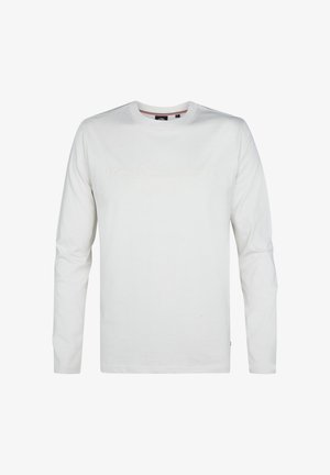 Witte longsleeve t-shirt van katoen met een ronde hals. Heeft reliëftekst op de voorkant en een klassieke pasvorm.