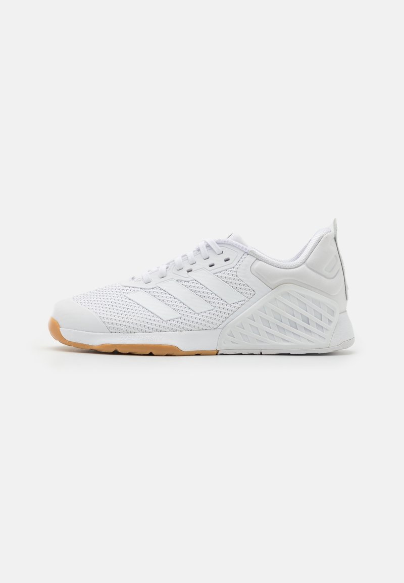 Witte sportieve schoen met netstof, rubberen zool, gestructureerde accenten en een drie-strepen logo in een lichtgewicht ontwerp. Bevat een gumzool.