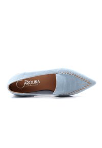 Light blue suede flat shoe with a pointed toe, featuring cut-out details along the sides and a leather interior with a branded insole.