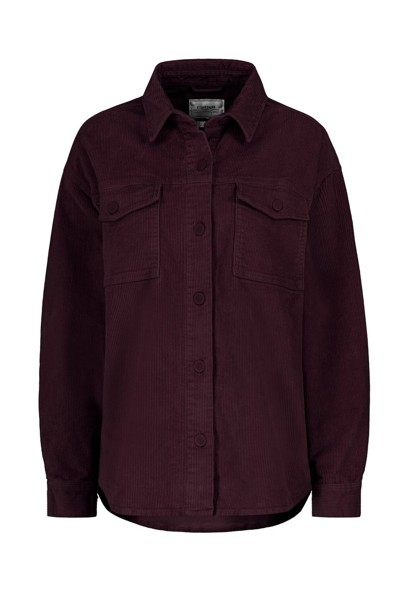 Burgundy corduroy shirt with a button-up front, two chest pockets, long sleeves, and a slightly curved hem. Textured fabric with visible ridges.