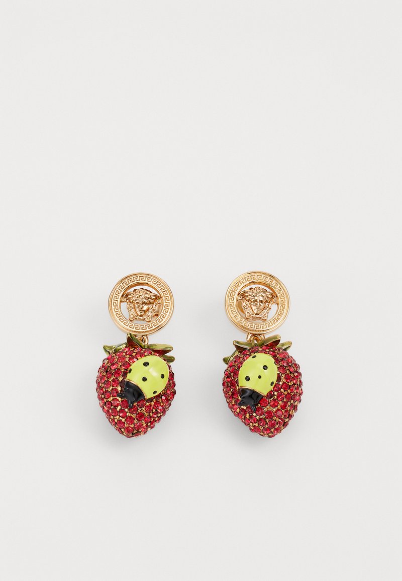Red strawberry-shaped earrings with green accents, adorned with red rhinestones, featuring gold-tone circular hardware with a lion head detail.