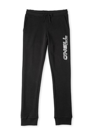 Pantalons de survêtement noirs avec taille élastique, fermeture à cordon, poches latérales, et texte de marque blanc sur la jambe gauche. Tissu tricoté doux.