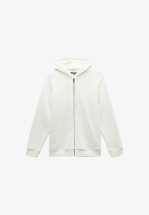 Weißer Zip-Hoodie aus weichem Stoff, mit einer Kapuze, zwei vorderen Taschen und Kordelzügen. Gerippte Bündchen und Saum; minimalistisches Design.