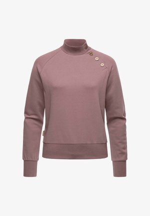 Mauve värvi kootud kampsun, millel on kõrge krae ja neli nuppu vasakul õlal. Valmistatud pehmest materjalist, millel on lähedane lõige ja soonikkoes mansetid.