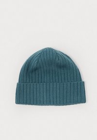 Berretto lavorato a maglia in teal, caratterizzato da una texture a coste e un orlo piegato. Il design è semplice e privo di decorazioni.