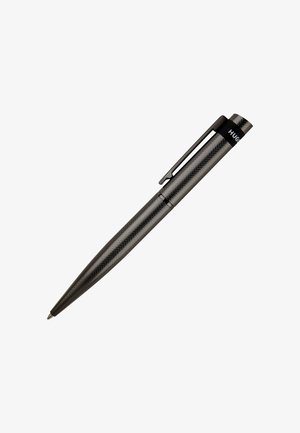 Black textured metal ballpoint pen with clip and a partial brand name visible near the top.