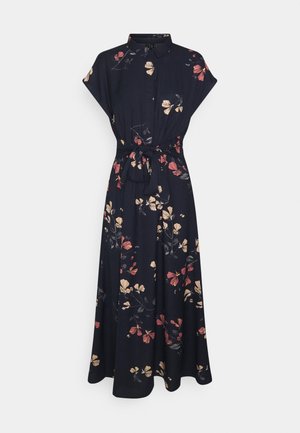 Marineblauwe midi-jurk met korte mouwen, kraag, bloemenprint in beige en rood, en een taillestrikriem.