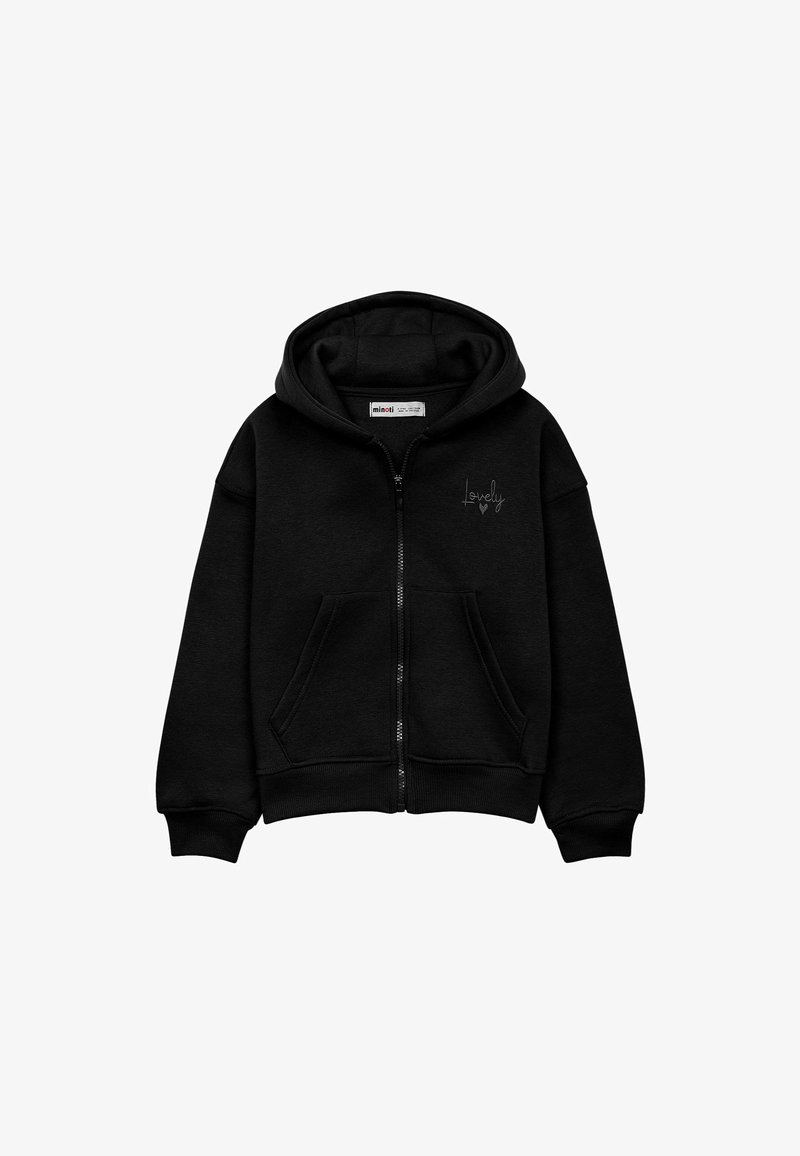 Melns zipa kapuci, kas izgatavota no mīksta auduma. Tam ir priekšējais rāvējslēdzis, divas sānu kabatas un kapuce. Uz kreisā krūšu laukuma ir maza "Lovely" uzraksts.