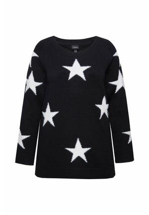 Černý pletený svetr s velkými bílými hvězdnými vzory. Kulatý výstřih a dlouhé rukávy s ribovanými manžetami a lemem. Měkká textura.