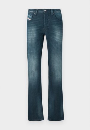 Mørkeblå denimjeans med en let falmet effekt, lige ben, to forlommer og et lille mærkat på højre lomme.