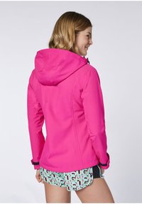 Fuchsia women's jacket with hood, long sleeves, and elastic cuffs. Smooth fabric; curved seams and zipper detail at neck.