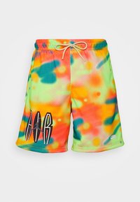 Mesh shorts with a multicolor tie-dye pattern in orange, green, and blue, featuring an elastic waistband and black logo detail on the leg.