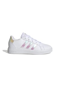 White synthetic sneakers with three iridescent stripes, textured rubber sole, and white laces. Rounded toe and low-top design.