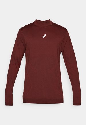 Top termic cu mânecă lungă, de culoare vișinie, confecționat dintr-un material moale și elastic, cu guler înalt și design ajustat. Prezintă un mic logo alb pe piept.