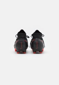 Nike Performance Jalkapallokengät kiinteälle alustalle - black
