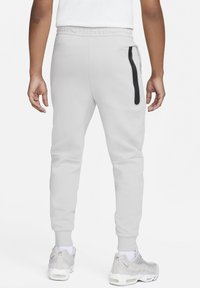 Nike Sportswear M TCH FLC S - Verryttelyhousut - light iron ore baltic blue