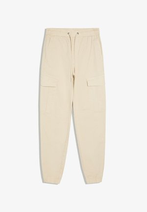 Beige Cargohose mit elastischem Bund, Kordelzug, zwei Seitentaschen, zwei große Klapptaschen an den Beinen und elastischen Bündchen.